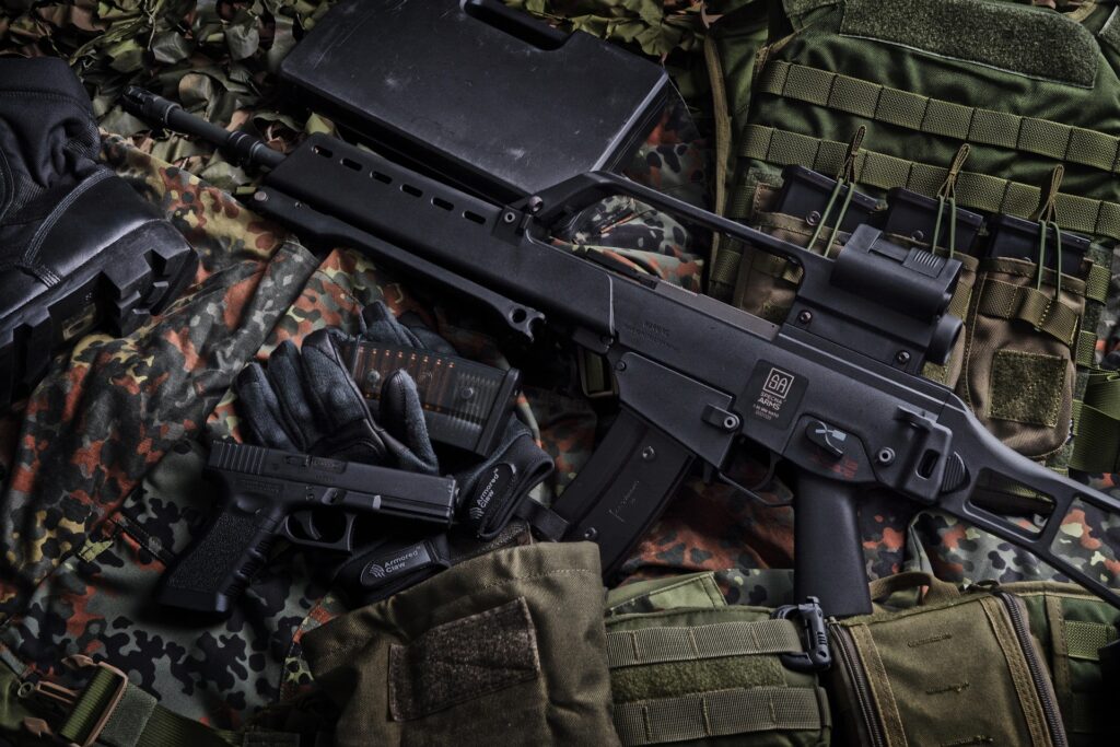 Airsoft camo protective equipment and rifle