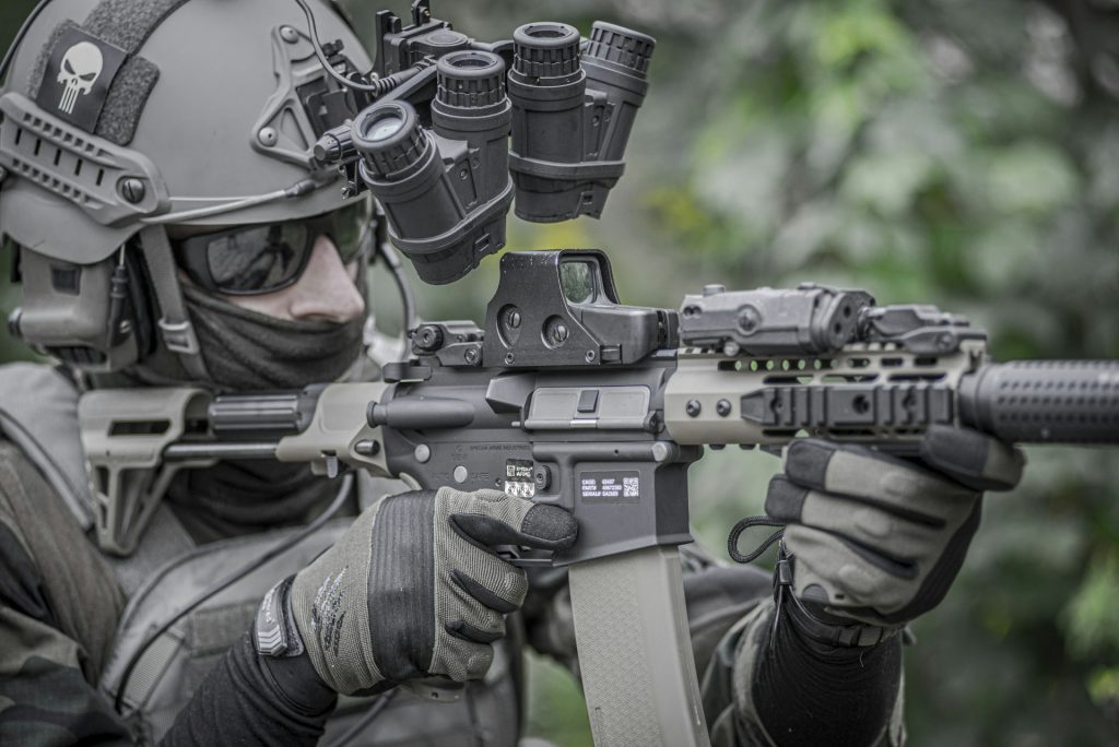 Airsoft player with gun