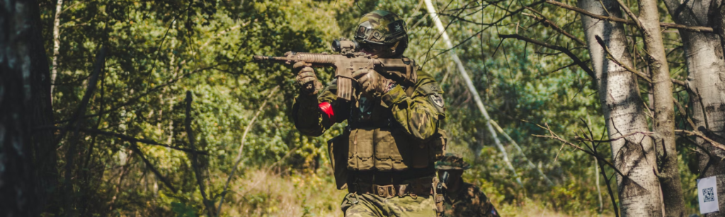 Airsoft player in woods