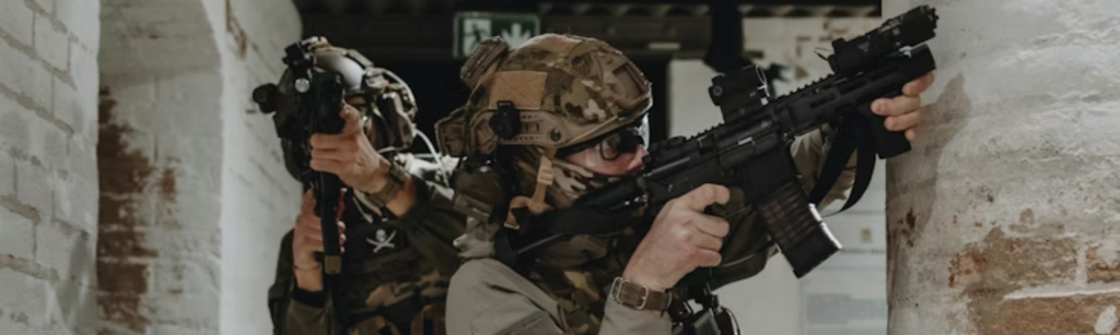 Airsofters in old building