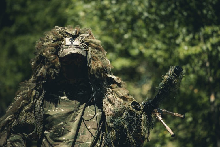 A sniper airsoft player