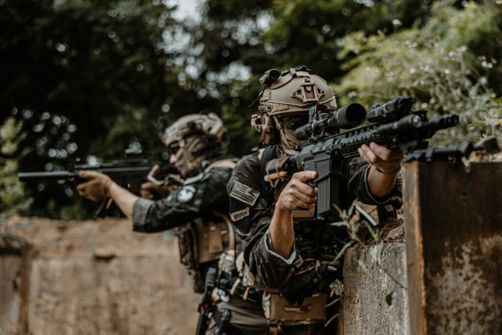 Two people playing an airsoft skirmish