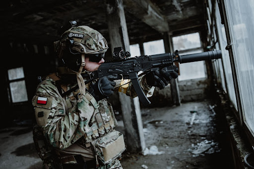 Airsoft player in goggles outside
