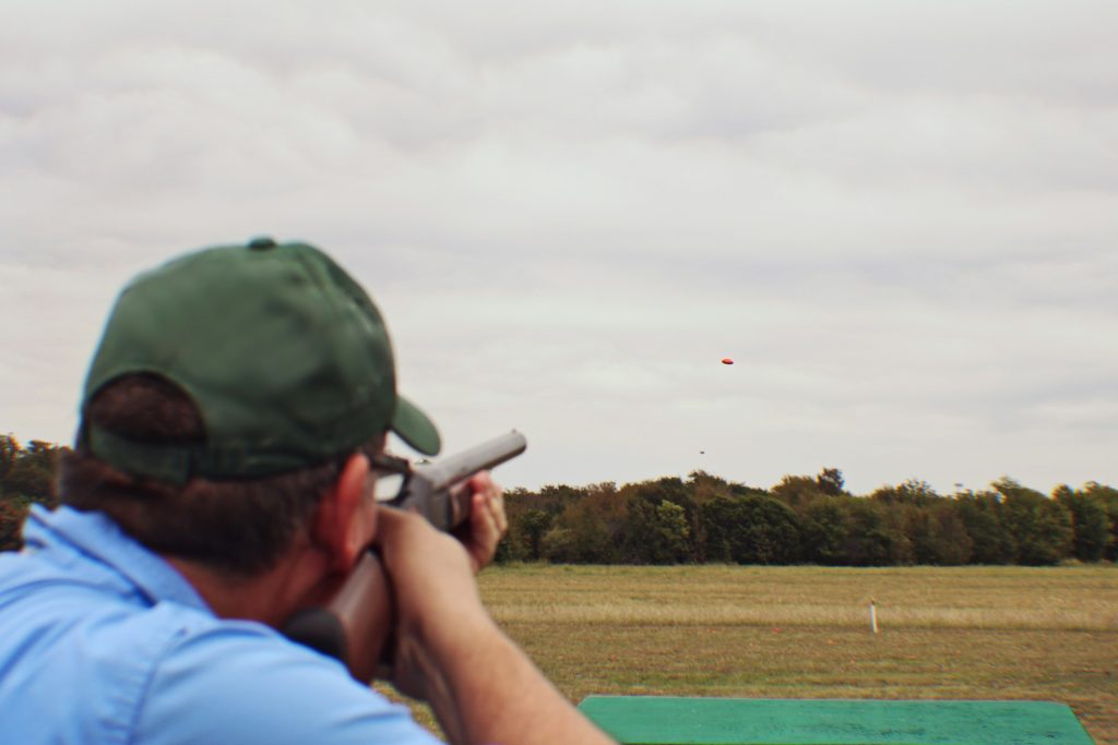 Someone clay pigeon shooting