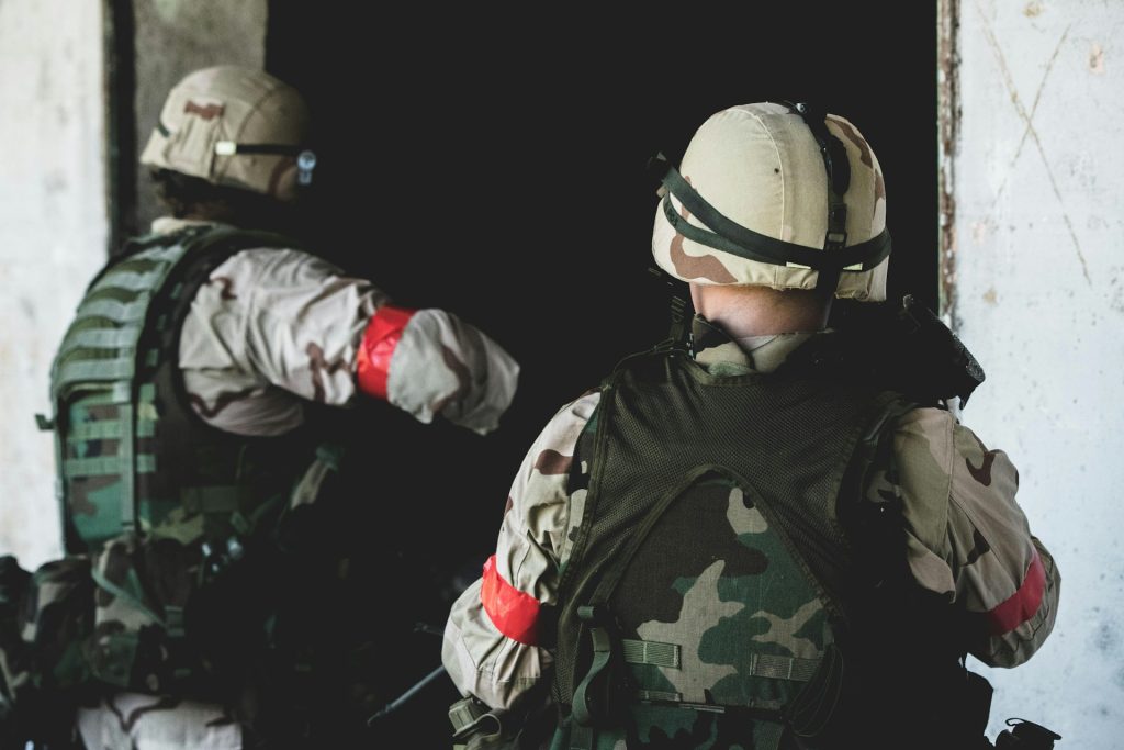 Two airsoft players wearing body armour