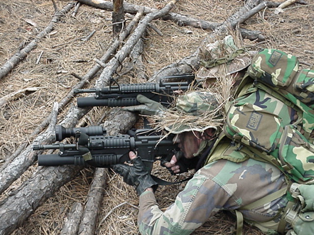 Two members of a recon team laying down