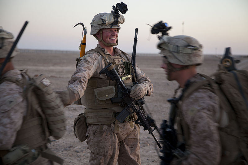 Squad leader cracking jokes with team