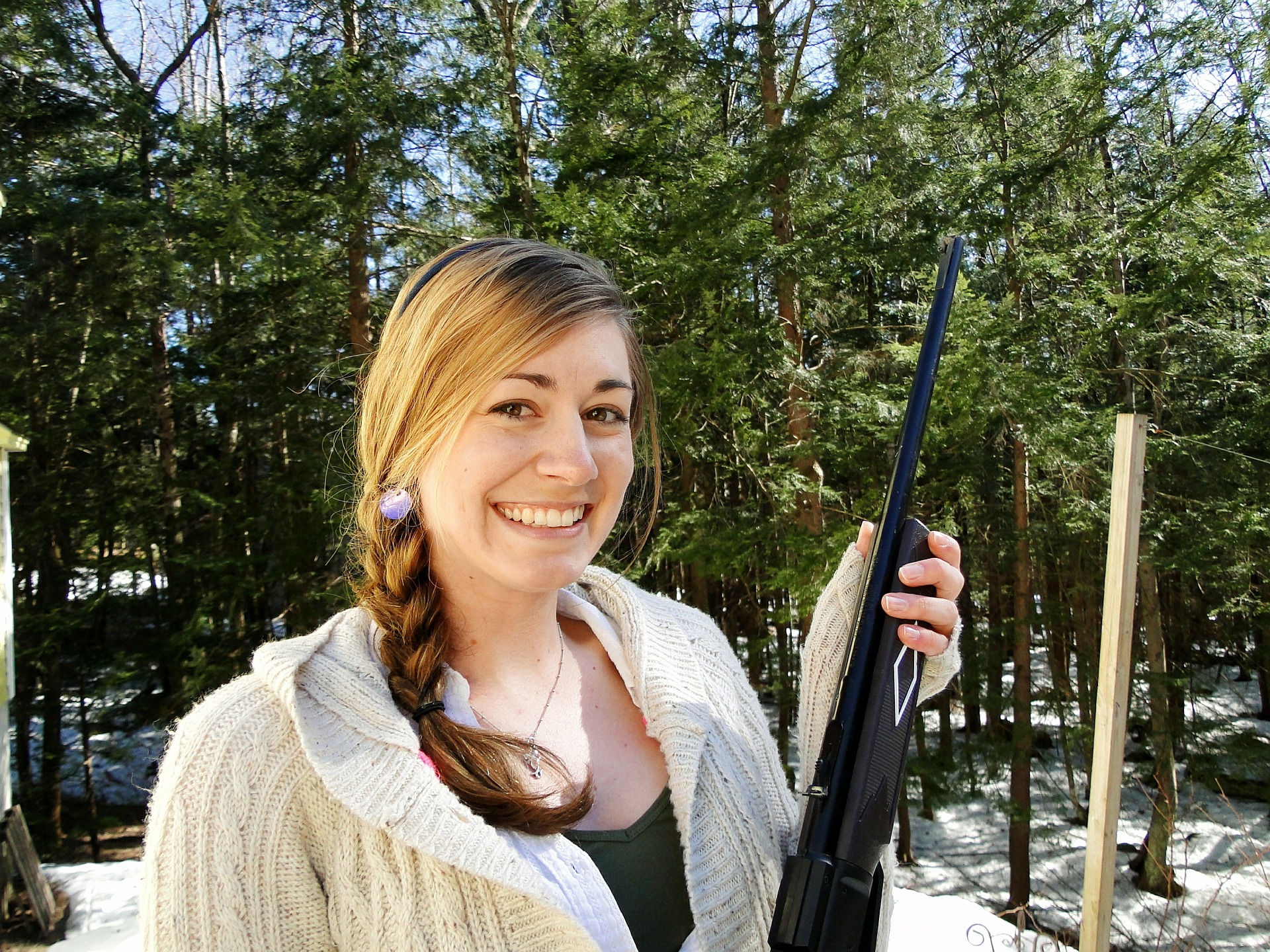 Woman holding a BB gun
