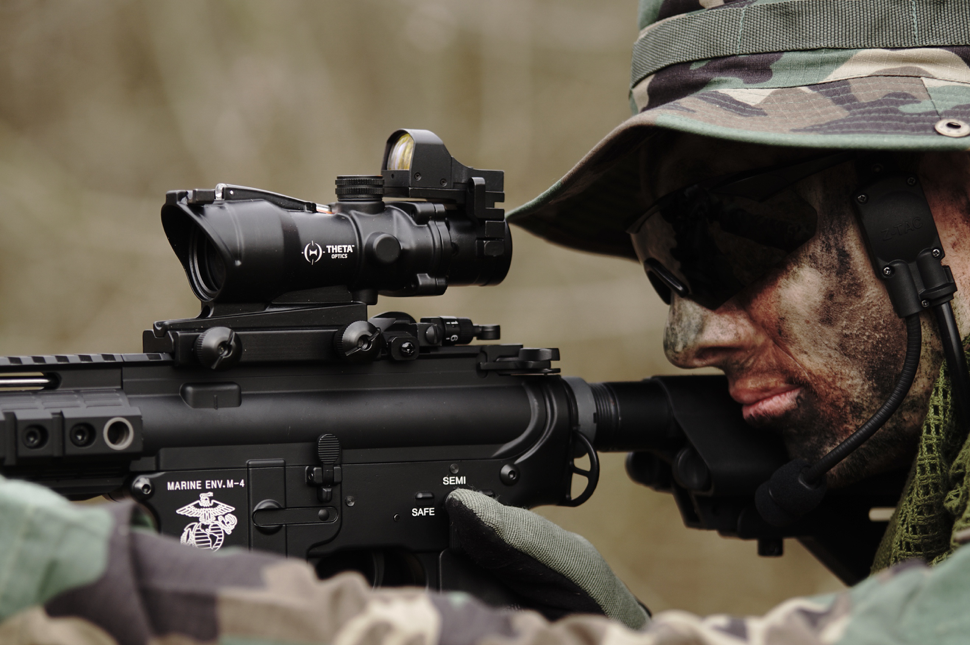 Solider looking down gun scope