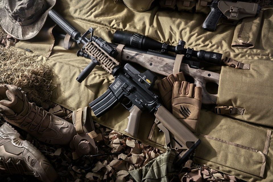 Airsoft rifle and camouflage equipment