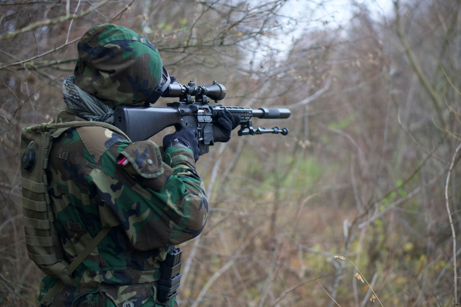 Person with rifle shooting